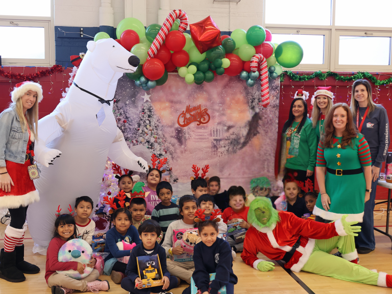 Texas Avenue School Holds Santa's Workshop Toy Giveaway