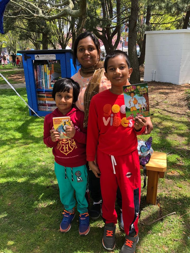 Rowsan Jahan, center, stands with her daughter, Fatihas, 5, and son, Ahil, 7. Faitha and Ahil were the first people to take b