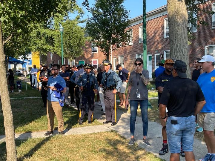 Law enforcement professionals and civic leaders visit Stanley S. Holmes Village & Extension for annual community walk. Photo